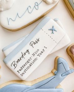 decorated cookies are displayed on a white surface