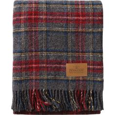 The Pendleton Carry Along Motor Robe blanket hearken to an earlier time of horse-drawn buggies and trains, and although a lot's changed since the days of steamer rugs, the comfortable, cozy quality of these blankets hasn't. Made from 100% pure virgin wool woven in Pendleton's Mill at the base of Oregon's Blue Mountains, the Motor Robe Blanket is the perfect companion to take to the beach, concert, festival, or campsite, and even comes with a durable leather carry handle for easy transportation. Wool Blanket Edging, Wool Blanket Men, Tartan Plaid Furniture, Wool Blanket Pendleton, Recycled Wool Sweater Blanket, Wool Blanket Stitch, Wildwood Plaid Blanket, Wool Blanket Christmas Trees, Pillows Made From Wool Blankets