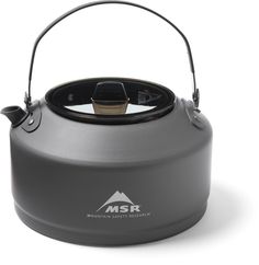 the msr mountain series stove is shown with its lid open