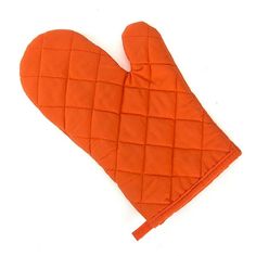 an orange oven mitt sitting on top of a white table