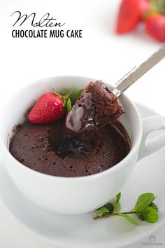 a chocolate mug cake with strawberries in it