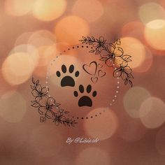 a dog's paw with hearts and flowers in the center on a blurry background