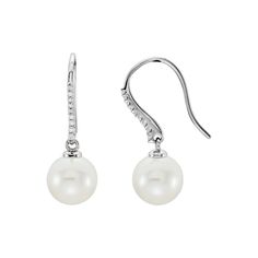 Simply elegant! Each near round white pearl set in this 14k white gold dangle range in size from 9.5 to 10mm in diameter and are AA quality (clean; good shape; good luster). Each pair is prong set with eighteen round diamonds that are I1 in clarity, G-H in color and the combined weight is 1/8 of a carat. The approximate length of this dangle style earring is 26mm (1-inch). Due to the nature of pearls, colors may not match what is shown. Pearl treatment: bleached. Diamond treatment: natural, not Pearl Diamond Dangle Earrings, Gold Beauty, Dangle Hoop Earrings, Diamond Dangle Earrings, Bow Jewelry, Gold Bracelet For Women, Ladies Diamond Rings, Gold Diamond Earrings, Pearl Set