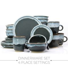 the dinnerware set is blue and has black glazes on it's sides