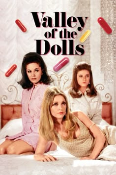 the poster for valley of the dolls shows two women on a bed and one is lying down