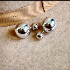 Double Stud Silver Ball Earrings Two Ways To Wear -One With Larger Ball In Front -One With Smaller Ball In Front Fun And Easy Double Stud, Ball Earrings, Silver Logo, Cubic Zirconia Earrings, Stone Studs, Zirconia Earrings, Blue Gems, Silver Stud Earrings, Dangly Earrings