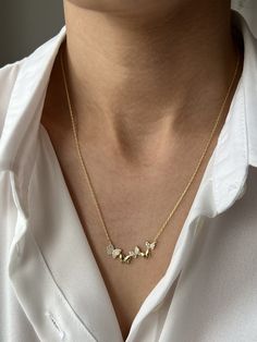 All of the butterflies will be following you Get this beautiful minimalist jewelry made with the quality of perfect elements✨ You can choose 925K Sterling Silver with the options of Gold, Rose Gold or White Gold colors. High quality jewelry for everyone 🤍  Details * 925K Sterling Silver Option → 18K Gold, Rose Gold or White Gold plated * Chain length is 18 inches / 45 cm * Time is everything! You will receive your package as soon as possible 🚚  * We care about the quality of metal to make sure it will last for a long time * We use enamel technique to color the jewelry and high quality zircons only * There can be tiny differences on each item. Color changes and shade differences of the stones and enamel is possible since each jewelry piece is unique and special * That beautiful piece will Dainty Butterfly Necklace For Anniversary, Dainty Butterfly Charm Necklace For Anniversary, Elegant Everyday Butterfly Charm Necklace, Dainty White Gold Butterfly Necklace, Elegant Everyday Butterfly Necklace, Dainty 14k Gold Butterfly Necklace, Minimalist Sterling Silver Butterfly Necklace, Gold Sterling Silver Butterfly Necklace, Dainty Yellow Gold Butterfly Necklace