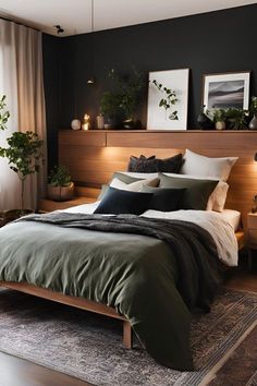 a bedroom with black walls and green bedding