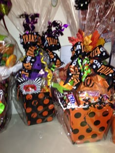 several halloween baskets with candy and candies in them