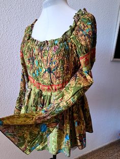 Savage Culture top, floral design in green, red, turquoise, pink, smocks at the bust and back, so it ensures optimal comfort without tightening and is flared and open at the bottom. 100% cotton, marked size M/L. Very good condition Flat measurements: armpit to armpit - from 44 cm/17.2'' to 54 cm/21.2'' waist - from 38 cm/15'' to 42 cm/16.5'' length - 62 cm/24.4'' Turquoise Rose, Blouse Summer, Lace Trim Blouse, Blouse Lace, Summer Blouse, Blouse Long Sleeve, Red Turquoise, Summer Blouses, Top Floral