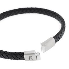 This braided leather bracelet embodies unwavering strength and reliability. Featuring a branded metal clasp, it ensures a secure and comfortable fit around the wrist. This slim, elegantly braided bracelet is the quintessential stylish leather accessory.- WIDTH: 6 mm- MATERIAL TYPE: 100% genuine Cowhide leather- CLASP COLOR: Brushed silver- CLASP MATERIAL: 316L stainless steel- CLASP TYPE: Magnetic