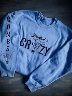 Luke Combs Beautiful Crazy crewneck sweatshirt, Carolina Blue. Luke Combs crew neck sweatshirt, Luke Combs Concert Crewneck. Gildan, super soft material and very durable. Luke Combs Sweatshirt, Luke Combs Shirt Ideas, Luke Combs Concert, Buffalo Bills Shirt, Bills Shirts, Beautiful Crazy, Luke Combs, Cute Modest Outfits, Country Quotes