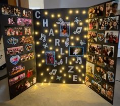 an open photo album decorated with lights and photos