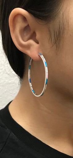 "Brand new hoop earrings with lab created multicolor Fire Opals inlay on solid 925 sterling silver and stamped with 925. There are 10 pieces of opal inlay on the front of the hoop and 10 pieces on the inside. Hoops measures 2\" wide or 53mm. Our silver is genuine 925 sterling silver and Rhodium plated for better quality and prolonged shine. You will receive the item in a gift box Thanks for looking and check out more items in my Etsy shop for more great items and deals! https://www.etsy.com/shop Nickel-free Multicolor Sterling Silver Hoop Earrings, Multicolor Round Hoop Earrings, Multicolor Pierced Round Hoop Earrings, Modern Multicolor Hoop Jewelry, Fire Opals, Jewelry Earrings Hoops, Fire Opal, Solid 925 Sterling Silver, Rhodium Plated