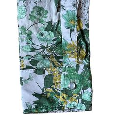 -Japanese floral printed 100% cotton. -Western front and back yoke. -Pearl Snap Button. -Cut and sewn in USA. -Washed and dried at a local Ridgewood laundromat for minimal shrinking. CHEST SHLDR CTR BK SLEEVE S 42 17.5 28.75 24 5/8 M 44 18 29.5 25 L 46 18.5 30.25 25.25 XL 48 19 30.75 25.5 XXL 50 19.5 31.5 25.75 Green Cotton Shirt With Floral Print, Floral Print Cotton Shirt, Green Floral Print Button-up Shirt, Western Front, Western Shirt, Western Shirts, Floral Printed, 8 M, Snap Button