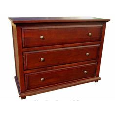 a wooden dresser with three drawers and brass knobs on the bottom drawer, against a white background