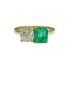 This 18k yellow gold emerald and diamond ring weighs 4.3 grams. Nice and dainty, the ring has a two-stone, toi et moi design featuring an emerald weighing 0.86 carats (exactly) and a diamond weighing 1.01 carats (exactly). The emerald is faceted in a squared emerald cut and is securely set in its' own four pronged setting. The stone has an intensely rich green color with heaps of fire and translucency, with minor natural inclusions commonly found in emeralds that do not affect the stones beauty. Colombian Emerald Ring, Emerald And Diamond Ring, Emerald Cut Rings, Colombian Emeralds, Rich Green, Cushion Cut Diamonds, Wedding Board, Ring Diamond, Emerald Ring