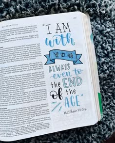 an open bible with the words i am with you, always to the end of the age