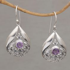 Smooth petals open gracefully to reveal stunning gemstones and traditional floral bun openwork in this pair of dangle earrings from Bali. Artisan Wirabhuwana handcrafts the earrings from sterling silver, with a total of over two carats of faceted round amethysts that sparkle from within bezel settings. Blue Nile Jewelry, Butter Shrimp, Fancy Jewellery Designs, Silver Jewellery Indian, Jewelry Workshop, Diy Wire Jewelry, Purple Pearl, Classy Jewelry, Silver Dangle Earrings