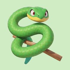 a green snake is sitting on top of a branch with a stick in it's mouth