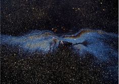 an image of some blue and black stuff in the dark sky with stars all over it