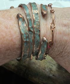 I've now got more delicate bracelets to offer.  You'll receive 2 of my verdigris patina cuffs.  these are new additions to add to my collection of cuffs or bangles.  this listing has choices of cuff or bangle, finish, and size so please let me know what you want.  I love the new sizes they are 3/16" in width or slightly less than a quarter inch whereas the small flat cuffs before were all just slightly a little wider than a quarter inch in width, it doesn't sound like much but it really makes a difference.  Please let me know the actual measurements of your wrist if you want me to figure a size for you, or the cuff size you wear, or I can just make them an average size if you like but please message me and let me know if you need a large or petite sizes.  if you want open bangles or cuffs, Hammered Metal Jewelry, Handmade Copper Bracelet, Silversmithing Jewelry, Stacked Bracelets, Tube Bracelet, Aging Metal, Copper Plating