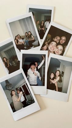 four polaroid photos of people posing for the camera with their arms around each other