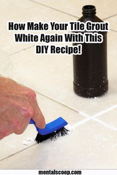 a person cleaning tile with a brush on the floor next to a black bottle that says, how make your tile grout white again with this diy recipe?