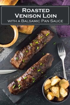 two steaks on a cutting board next to some potatoes and dipping sauce with a wooden spoon