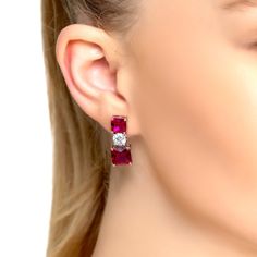 Are you looking for the perfect finishing touch for your look? Look no further than Penelope Drop Earrings Silver. Expertly crafted with 925 sterling silver, these glamorous and unique earrings are truly one of a kind. They feature two square cut lab-created rubies of differing size, separated by a super sparkling simulated diamond! What could be more glamorous? Ruby is one of the most popular gemstones in jewellery due to its deep, passionate red colour. It has been prized for centuries and is Russian Ruby Earrings, Drop Earrings Silver, Beaded Tassel Earrings, Long Tassel Earrings, Printed Jewelry, Ruby Earrings, Red Colour, Colorful Jewelry, Gold Print