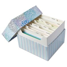 a blue and white striped file box filled with folders on top of each other