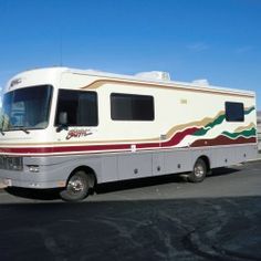 a motor home parked in a parking lot