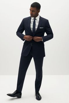 SuitShop has got you covered from the office to the wedding and everywhere in between. The answer to all your wedding party, wedding guest, workwear, special event, and date night wardrobe wants–this one suit can do it all. A new take on formalwear and everyday suiting, SuitShop is made for every body and every occasion. #groom #groomsmen #groomstyle #suit #bowtie #suitandtie Wedding Suit Guest, Navy Blazer With Suit Collar For Wedding, Navy Fitted Suit For Wedding, Fitted Navy Suit For Wedding, Navy Fitted Wedding Suit, Elegant Navy Blazer For Wedding, Navy Fitted Suit With Notch Lapel, Elegant Navy Suits For Work, Blue Fitted Suit For Black-tie Events