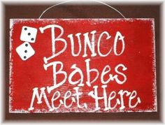 a red sign that says bunco bakes meet here with dices on it