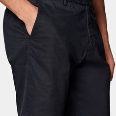 These navy flat-front shorts are cut slim through the hip and thigh, and feature belt loops. Cotton Shorts With Belt Loops, Fitted Bermuda Shorts With Straight Leg, Workwear Straight Leg Shorts With Belt Loops, Classic Short Bottoms With Belt Loops, Fitted Pants With Belt Loops, Casual High-waisted Business Shorts, Fitted Short Pants With Belt Loops, Workwear Bermuda Bottoms With Belt Loops, Classic Bottoms With Belt Loops And Short Inseam