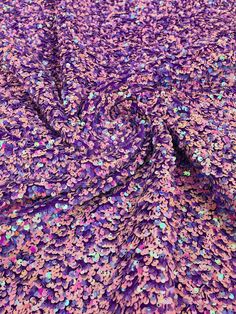 Stretch Velvet Sequins This beautiful design is a stretch velvet fabric that has sequins embroidered throughout the whole fabric. This fabric is ideal for decorative and apparel purposes. The width of the velvet fabric is 60" and the sequins are embroidered at 58"/ 60". Item is sold by the yard. If more than one yard is purchased, item will come in one piece. Details 5mm Sequins2 - Way Stretch Width: Stretch Velvet 58"/60"Content: 85% Polyester Please Note: *The digital images we display have th Mermaid Sequin Fabric, Lavender Uses, Dark Lavender, Pink Iridescent, Mermaid Sequin, Lavender Pink, The Velvet, Stretch Velvet, Sequin Fabric