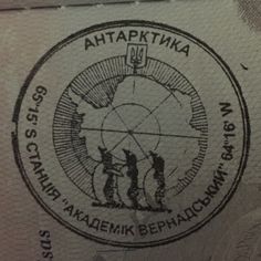 a stamp with the emblem of two people on it, and an inscription in russian