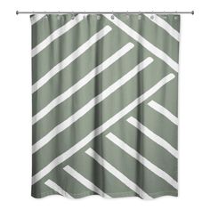 a green shower curtain with white lines on it