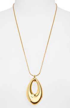 A surprisingly lightweight sculptural loop pendant swings from a generous chain on this gleaming necklace. 24 1/4" length; 1 7/8" extender; 1/2"W x 2 1/2"L pendant Lobster clasp closure Goldtone plate Imported Formal Teardrop Pendant Necklace With Detachable Feature, Formal Metal Pendant Drop Necklace, Modern Jewelry With Oval Pendant Cable Chain, Modern Pendant Chain Necklace For Formal Occasions, Modern Formal Chain Necklace With Pendant, Metal Teardrop Pendant Necklace, Modern Oval Pendant Necklace With Chain, Modern Yellow Gold Necklace With Large Pendant, Modern Formal Pendant Chain Necklace