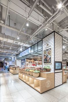 the inside of a restaurant with food on display