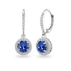 These beautifully attractive earrings feature 7mm round blue stones made with Swarovski crystals in a cubic zirconia studded halo design. The earrings are crafted of fine sterling silver and secure with leverback closures. These are great earrings for daytime or evening wear and are excellent gifts for women teens and girls. These crystal earrings in fine jewelry are great additions to your Swarovski jewelry and cubic zirconia jewelry collections. Size: one size. Gender: female. Age Group: kids. Halo Diamond Earrings In Sterling Silver, Sterling Silver Round Halo Diamond Earrings, Round Halo Diamond Earrings In Sterling Silver, Formal Blue Halo Earrings, Blue Halo Earrings For Formal Occasions, Round Crystal Earrings With Cubic Zirconia, Round Crystal Earrings With Sparkling Cubic Zirconia, Blue Cubic Zirconia Diamond Earrings With Prong Setting, Sterling Silver Round Earrings With Halo Setting