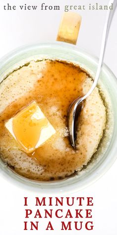 a pancake in a glass bowl with butter on top and the words, i minute pancake in a mug