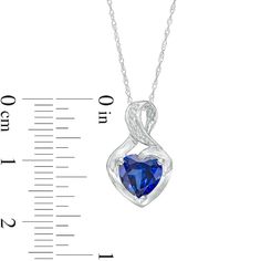 Gift her a charming and elegant symbol of your love with this heart-shaped blue lab-created sapphire and diamond accent pendant. Crafted in cool 10K white gold This look glistens with a 7.0mm heart-shaped bright blue lab-created sapphire. A diamond-accented ribbon loops around the center stone and artfully forms the twist bail above. Blue sapphire is the traditional birthstone for September and symbolizes truth, sincerity and commitment. The pendant suspends along an 18.0-inch rope chain that secures with a spring-ring clasp. Sapphire Heart Pendant Jewelry For Anniversary, Heart-shaped Sapphire Necklace For Formal Occasions, Heart-shaped Sapphire Necklace For Formal, Formal Sapphire Heart Pendant Jewelry, Formal Heart-shaped Sapphire Jewelry, Sapphire Heart Pendant Birthstone Jewelry, Sapphire Heart Pendant For Anniversary, Sapphire Heart Cut Birthstone Jewelry, Anniversary Sapphire Jewelry With Heart Charm