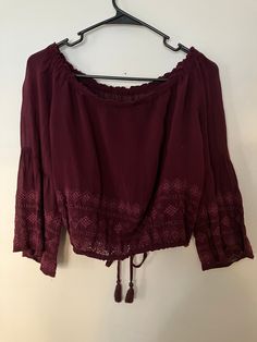 This sheer purple top is a true delight! Size small, with a drawstring waist, and flowing arms. Dress with comfort and style, and make this a staple in your wardrobe today! Flowy Purple Beach Top, Purple Flowy Beach Top, Long Sleeve Drawstring Top For Vacation, Long Sleeve Drawstring Tops For Beach, Purple Tops For Beach In Fall, Purple Tops For Fall Vacation, Purple Fall Tops For Vacation, Casual Long Sleeve Blouse With Drawstring, Casual Purple Tops For Fall Vacation