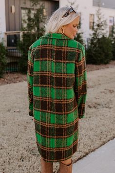 - Bundle up in this cozy plaid coat to keep the chill out! - Fully lined warm material with a green and brown hued plaid print - A collared neckline - Button closure - Long, loose sleeves - Functional low pockets - A relaxed silhouette that ends in a knee length hemline Measurements S : Bust 44", Hip 44", Length 37.5", Sleeve Length 28", Waist 42". M : Bust 46", Hip 46", Length 38", Sleeve Length 29", Waist 44". L : Bust 48", Hip 48", Length 39.5", Sleeve Length 29", Waist 46". Cozy Green Outerwear With Pockets, Cozy Green Outerwear With Button Closure, Green Collared Fall Outerwear, Green Collared Outerwear For Fall, Collared Green Outerwear For Fall, Green Outerwear For Cold Weather In Fall, Cozy Green Outerwear For Fall, Cozy Green Outerwear For Work, Loose Sleeves