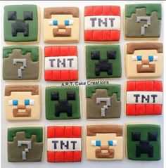 decorated cookies with the words tht and tmt on them are arranged in squares