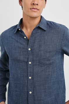 Super soft, breathable cotton fabric mixed with a relaxed body shape makes the Wyatt the perfect Southern California inspired button-down. A classic shirt featuring a single patch pocket at chest.    Relaxed fit 100% Cotton    Machine wash cold. Tumble dry low, remove promptly. No bleach. Cool iron when needed. Denim T Shirt, Denim Sweater, Mixing Fabrics, Short Shirts, Body Shape, Denim Pant, Shirt Accessories, Classic Shirt, Denim Shop