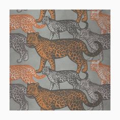 an orange and black leopard print on grey fabric