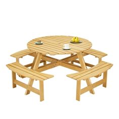 a wooden picnic table with two benches and a cup on the plate next to it