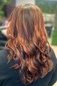 Woman with brown hair and bright auburn highlights. Brown Hair With Auburn, Hair With Auburn Highlights, Brown Hair With Auburn Highlights, Face Framing Highlights, Brown Auburn Hair, Balayage Styles